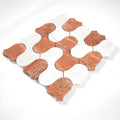 Decorative tile with a geometric pattern on a white background