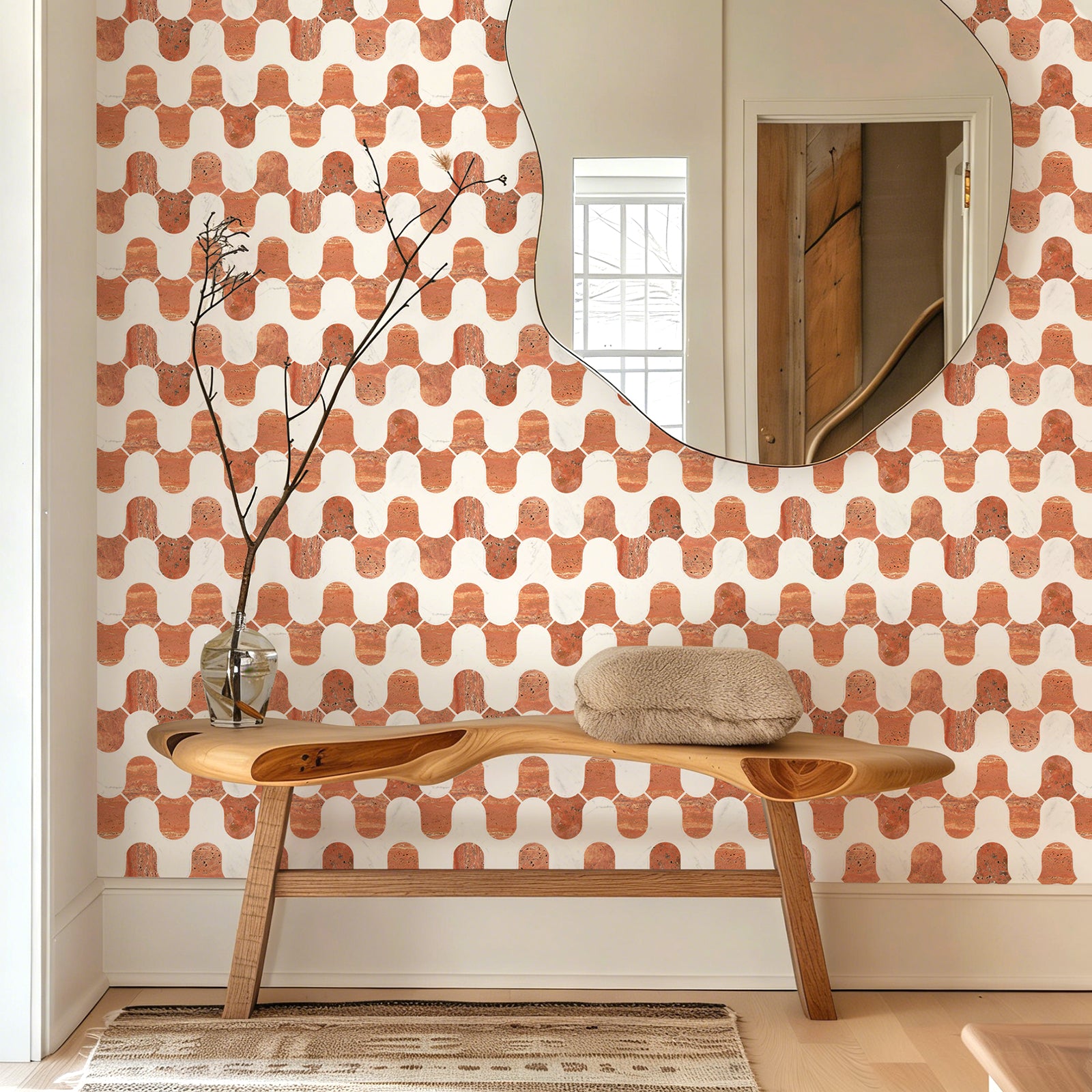Room interior with a wooden bench, mirror, and patterned wall.