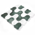 Green and white mosaic tile pattern on a white background