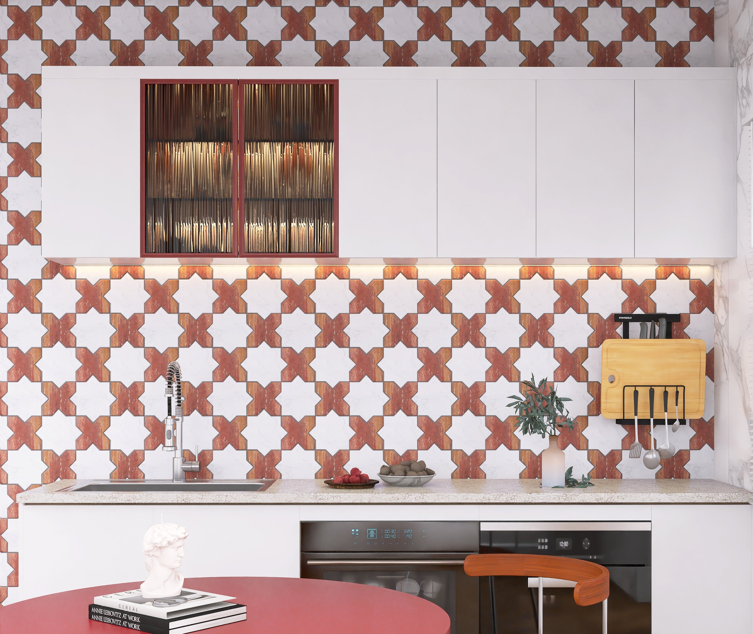 Modern kitchen with decorative wall tiles and white cabinets.