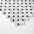 Mosaic pattern of white and black tiles on a white background