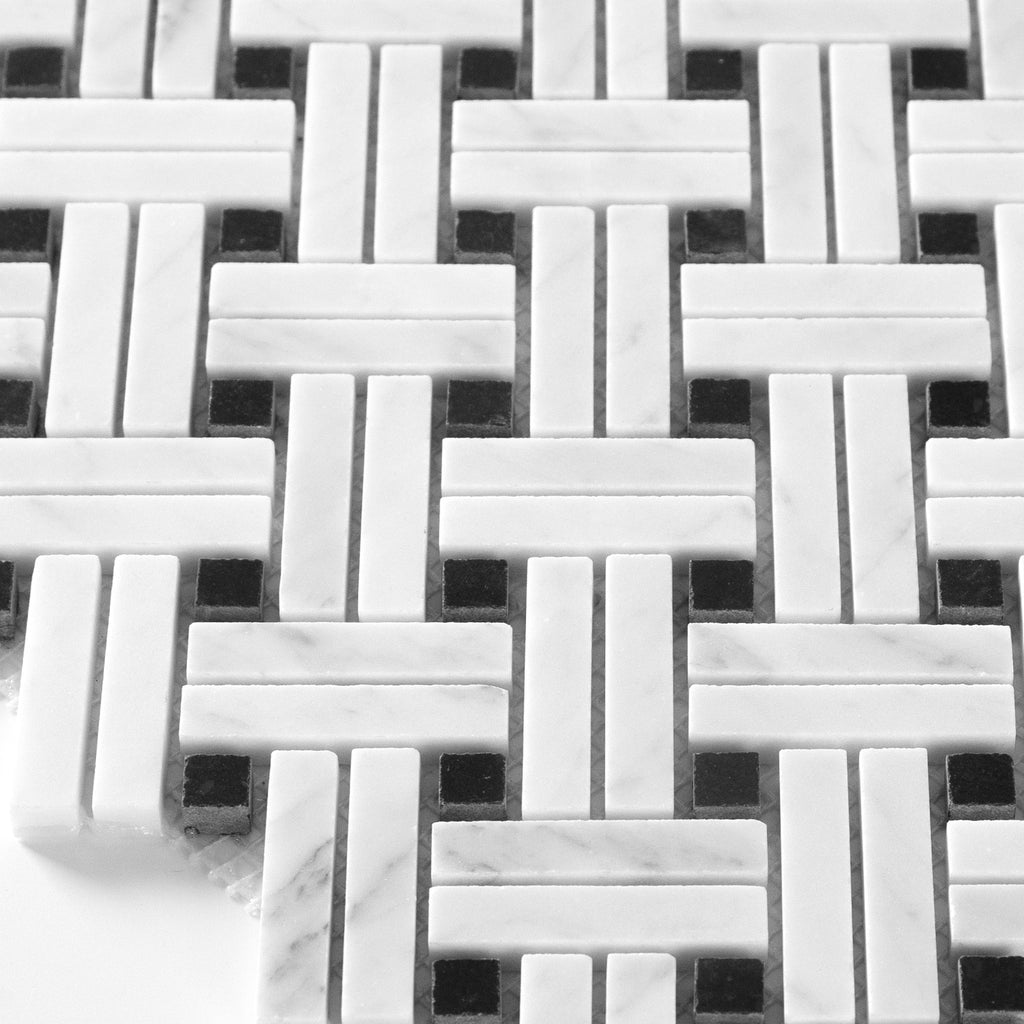 Close-up of a woven pattern with white and black tiles
