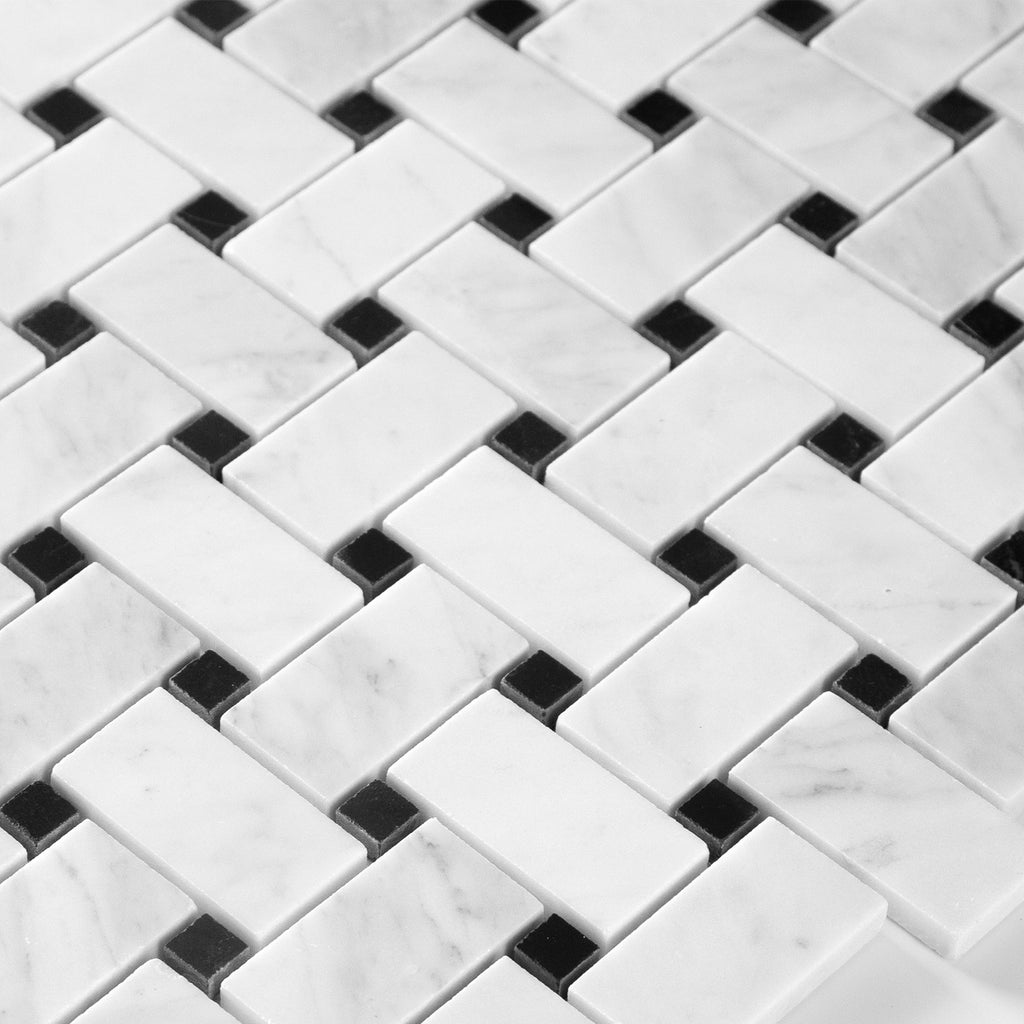 Close-up of a basketweave pattern with carrara white and black tiles