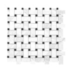 Mosaic basketweave pattern of white carrara and black marble tiles on a white background