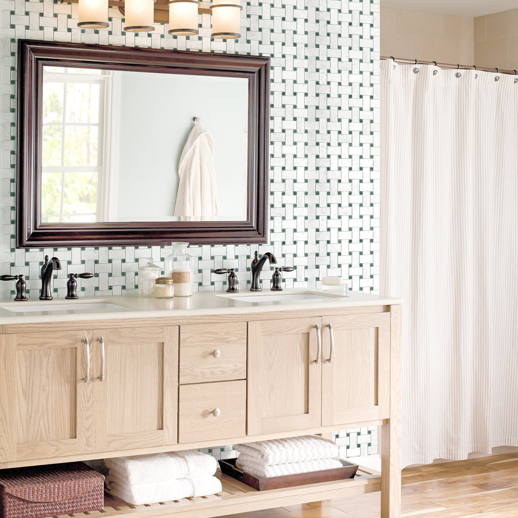 Bathroom with wooden vanity, mirror, and shower curtain.