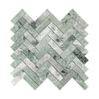 Green marble mosaic tile herringbone pattern on a white background