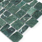 Green marble mosaic tiles on a white background