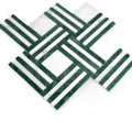 Green and white patterned tiles on a white background