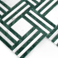 Geometric pattern of green and white tiles on a white background
