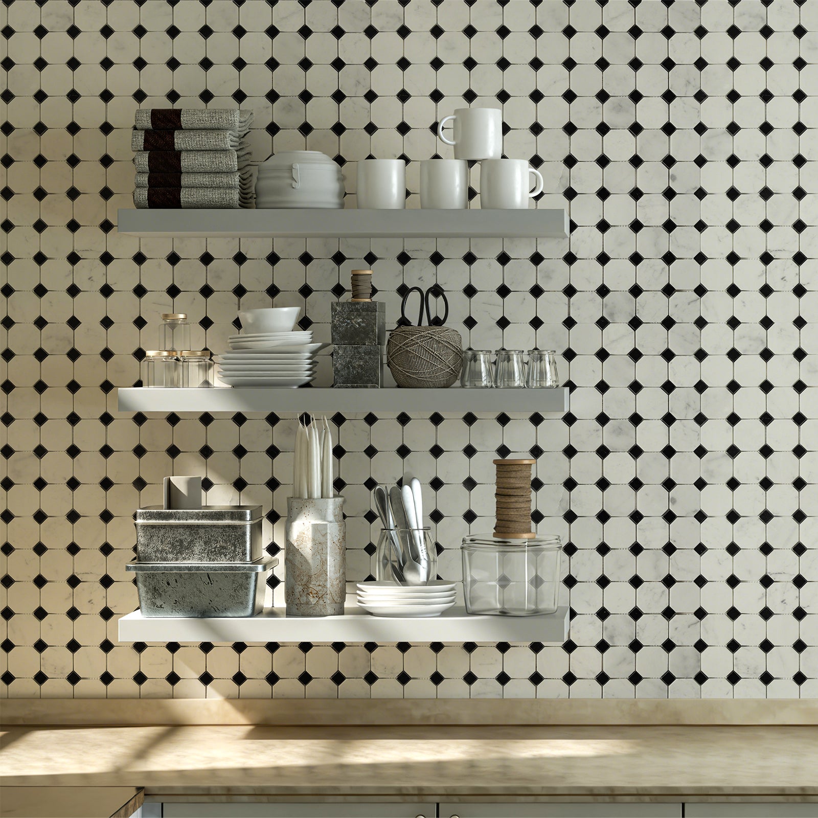 Kitchen with white shelves against a black and white tiled wall