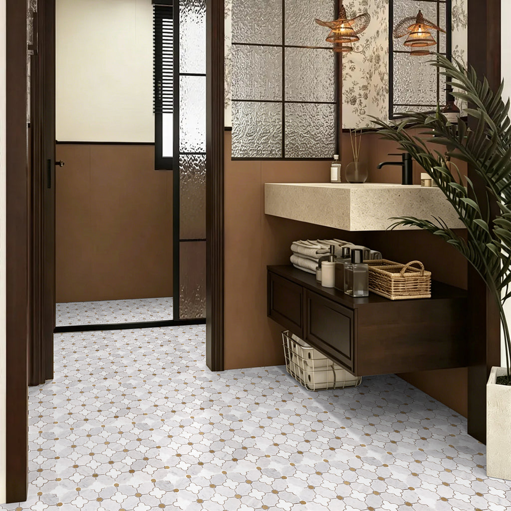 Modern bathroom with a sink vanity, towels, and decorative elements.