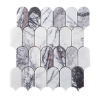 Feather-patterned marble tiles on a white background