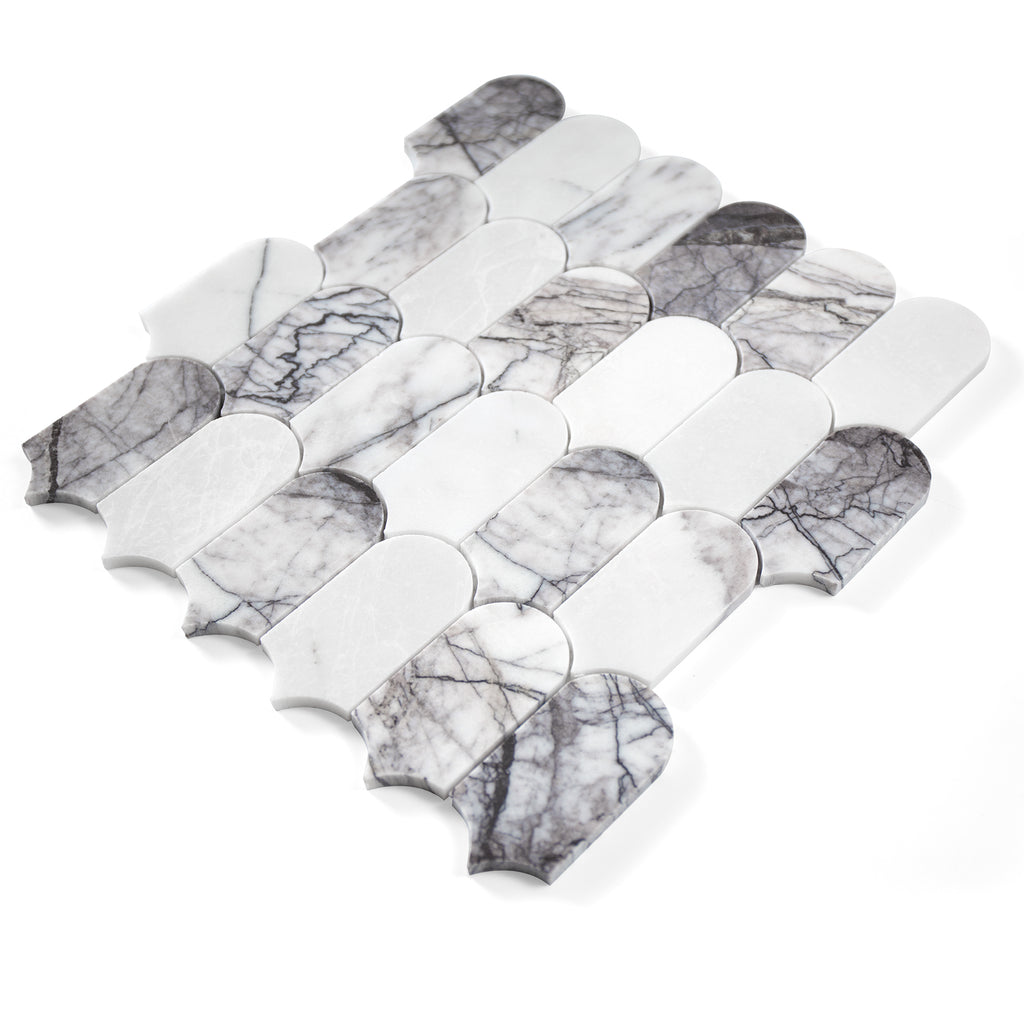 Set of feather-patterned marble mosaic tile on a white background