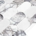 Marble-patterned tiles arranged in a grid on a white background