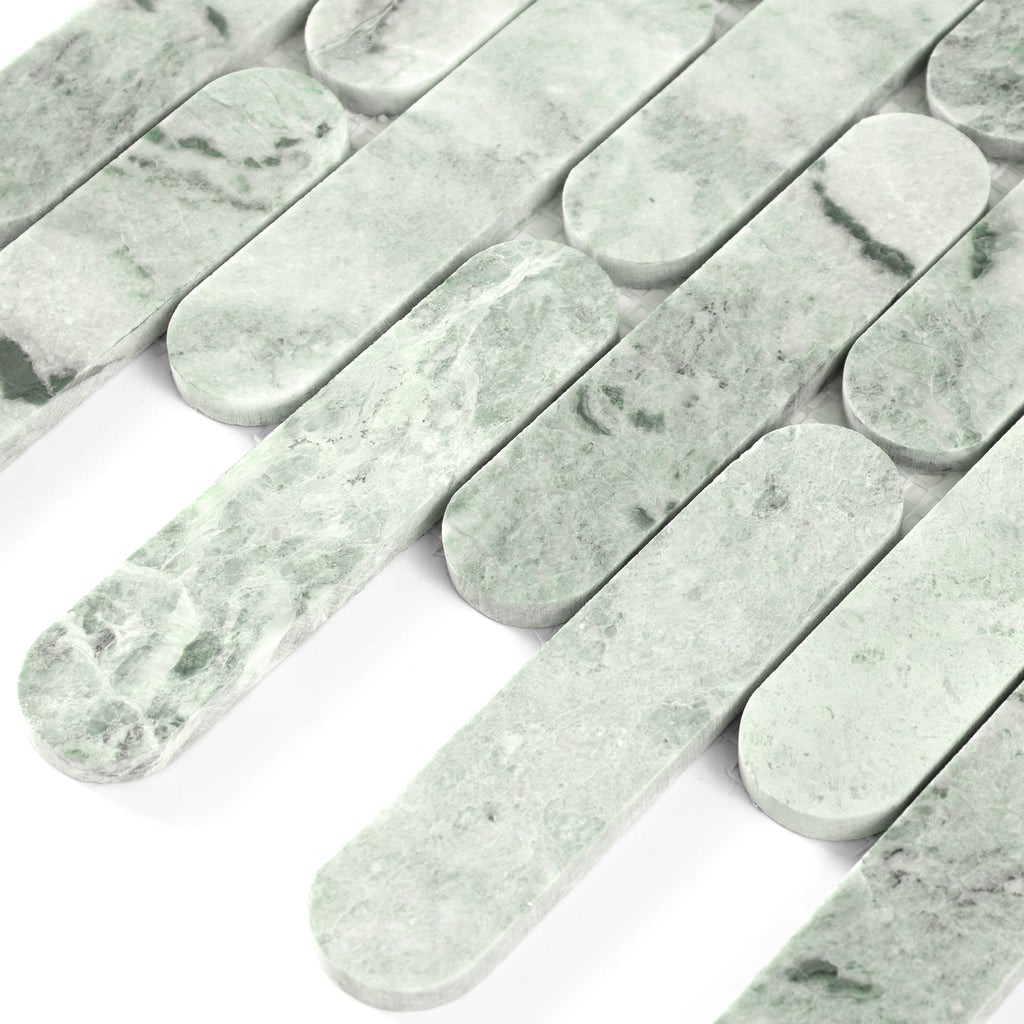 Green marble mosaic tiles on a white background
